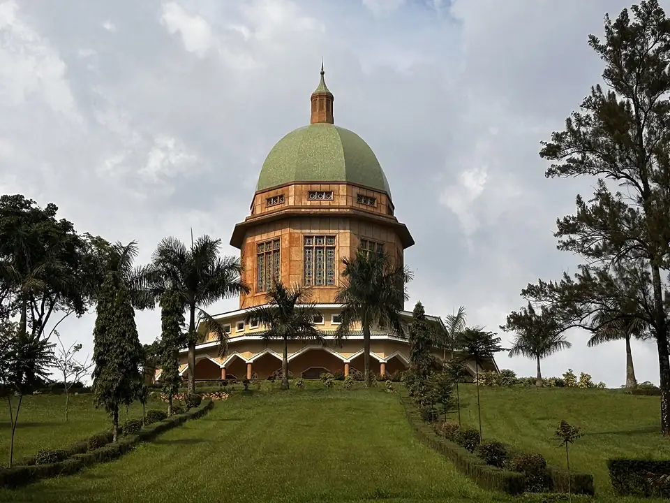 The green-domed Bahá'í House of Worship on Kikaya Hill, Kampala