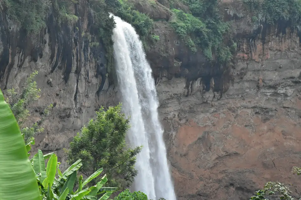 Sipi Falls dropping over a cliff on the slopes of Mount Elgon